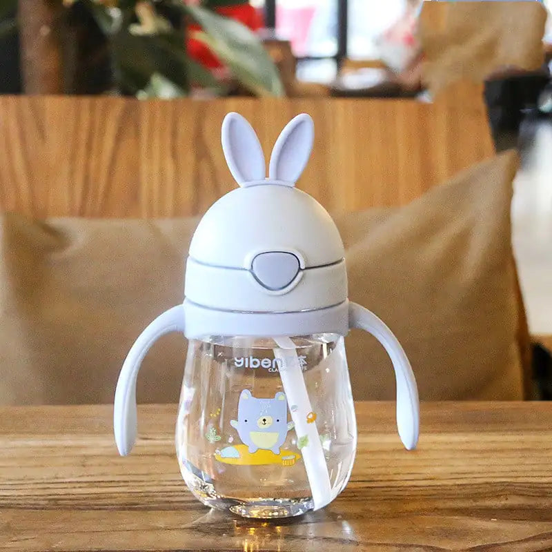 Baby drinking cup with measurement marks