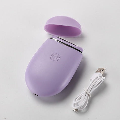 Women's electric shaver with washable blade and charging cable